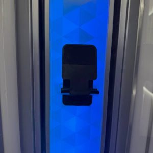 Smartphone holder for tanning machine